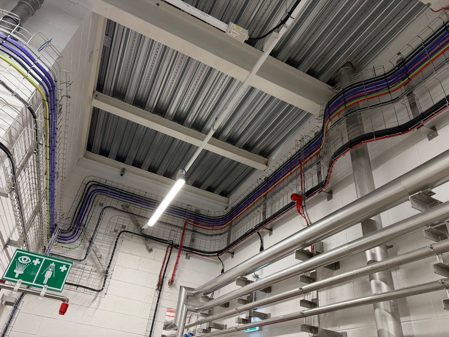 Galvanised cable basket and containment run overhead